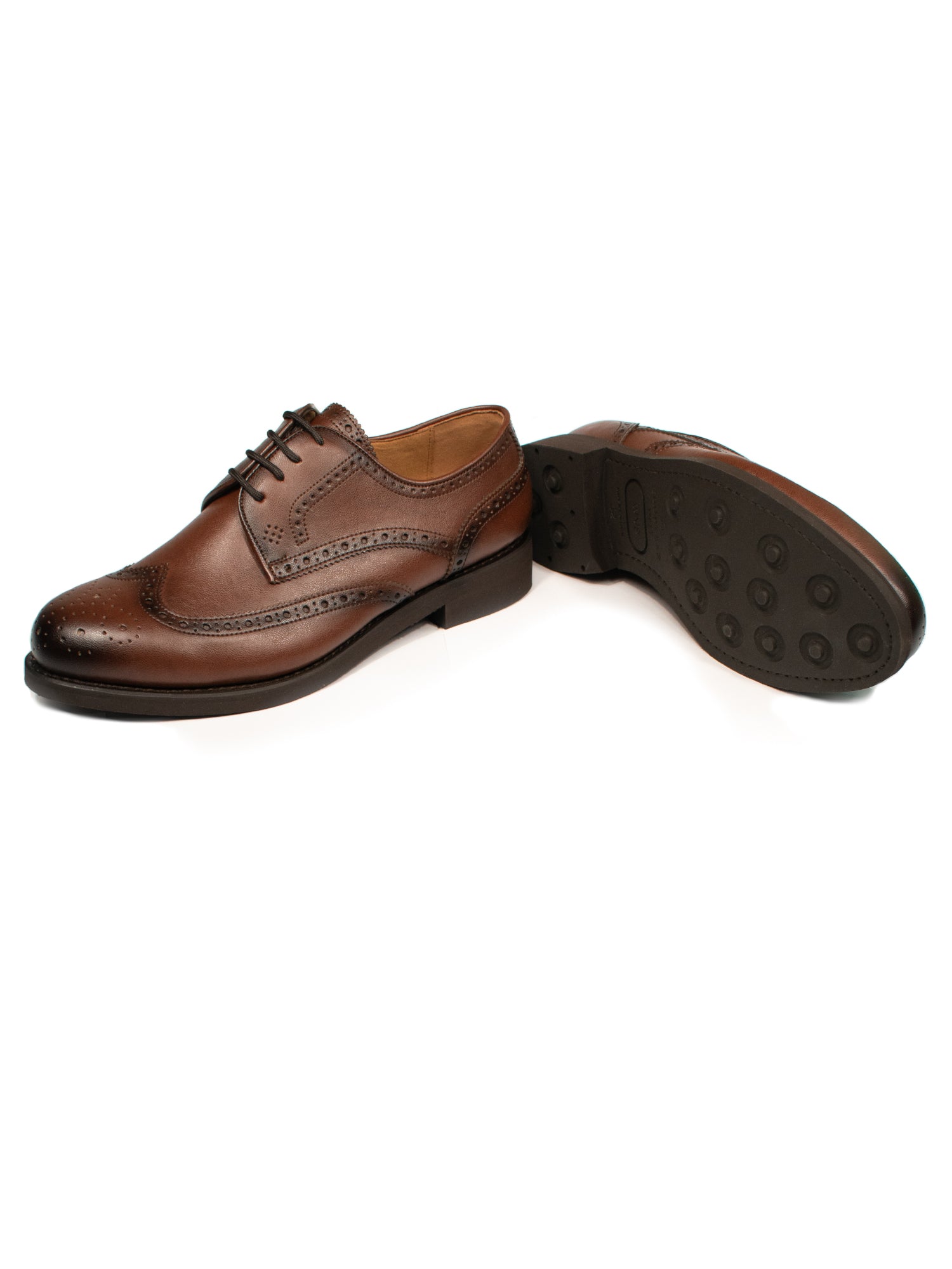 Back angle of chestnut Goodyear Welt Oxford Brogues, showing solid rubber outsoles, 2.5 cm heel and hand-finished details.
